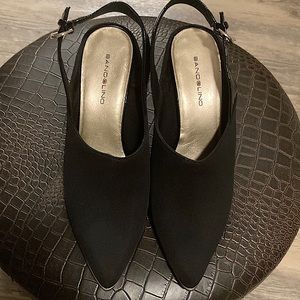 Black suede pointed toed heels. Used and only worn once!